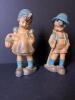 Pair of Roman Art Co. Robia Ware Boy and Girl Figurines