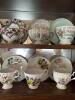 Wall-Mounted Curio Cabinet with Tea Cups - 4