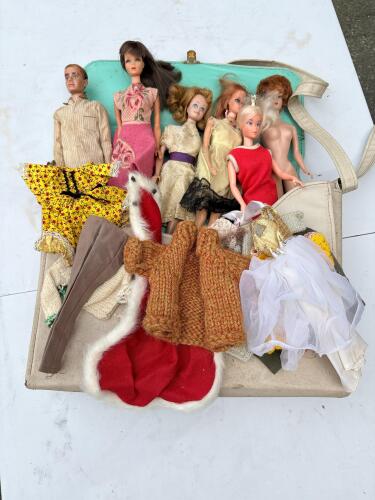 Lot of Vintage Barbie Dolls and Clothing Assortment