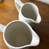 Pair of Stoneware Pitchers With Blue Snowflake Motif - 2