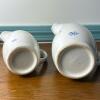 Pair of Stoneware Pitchers With Blue Snowflake Motif - 5