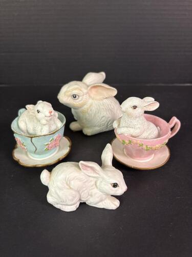 Four Porcelain Bunny Figurines in Teacups and Crouching Position