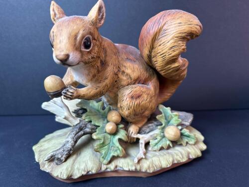 Porcelain Squirrel Figurine with Acorn, Signed 1977