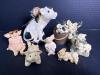 Pig Figurines and Cow Figurine Assortment
