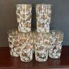 Eight Floral Gold and White Glass Tumblers