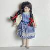 Porcelain Doll in Blue Gingham Dress with Pigtails