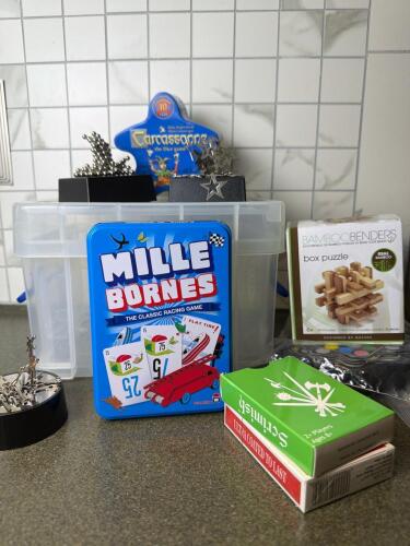 Assorted Board Games, Puzzles, Dice Sets, and Magnetic Desk Toys