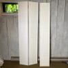Pair of White Multi-Panel Bi-Fold Closet Doors