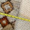 Handwoven Wool Rug with Geometric Border Design - 5