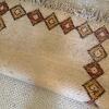 Handwoven Wool Rug with Geometric Border Design - 6