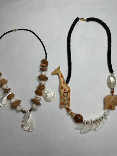 Handcrafted Wood, Shell, and Bead Necklaces with Animal Motifs