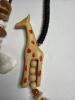 Handcrafted Wood, Shell, and Bead Necklaces with Animal Motifs - 3