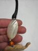 Handcrafted Wood, Shell, and Bead Necklaces with Animal Motifs - 5