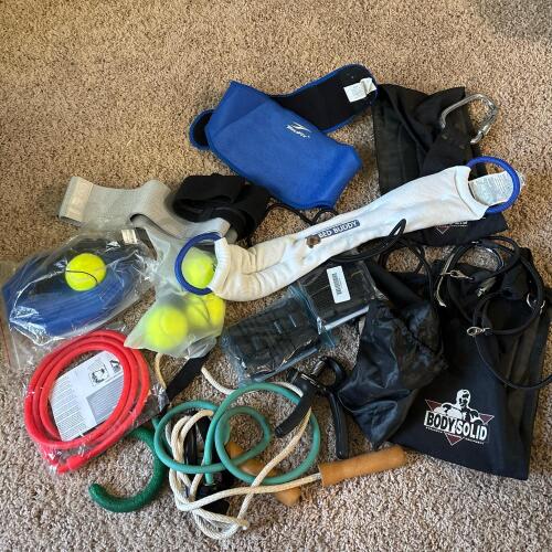 Assorted Exercise Bands and Fitness Accessories