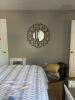 Round Wall Mirror With Goldtone Petal-Style Frame - 2