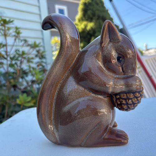 Ceramic Squirrel Figurine Holding Pinecone