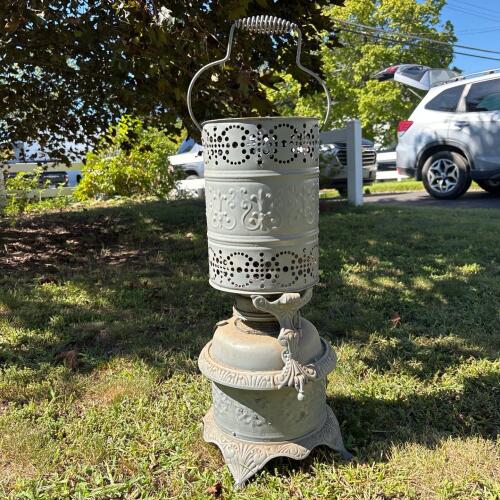 Vintage Metal Kerosene Heater with Ornate Detailing