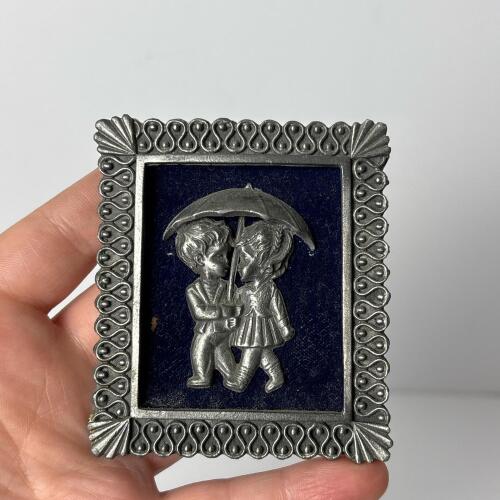 Small Framed Metal Plaque of Children Under Umbrella