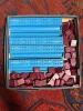 Scrabble Board Game with Maroon Letter Tiles and Blue Racks - 4