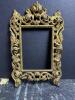 Ornate Brass-Style Picture Frames in Rococo Manner