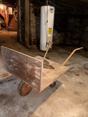Vintage Wooden Wheelbarrow with Metal Frame and Single Wheel
