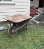 Antique Metal Wheelbarrow with Wooden Handles