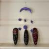 Painted Wooden Celestial Mobile and Three Tribal-Style Wooden Masks