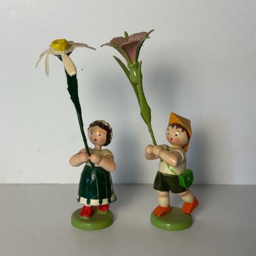 Wooden Figurines in Folk Art Style with Flowers
