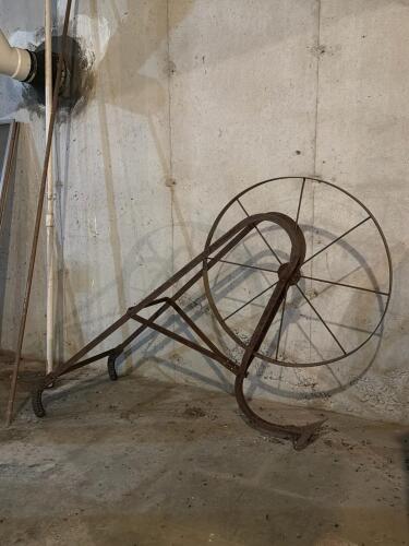 Antique Iron Farm Plow with Large Metal Wheel