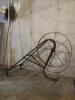 Antique Iron Farm Plow with Large Metal Wheel