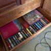 Assorted Paperback Novels and Jigsaw Puzzles