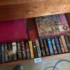 Assorted Paperback Novels and Jigsaw Puzzles - 7