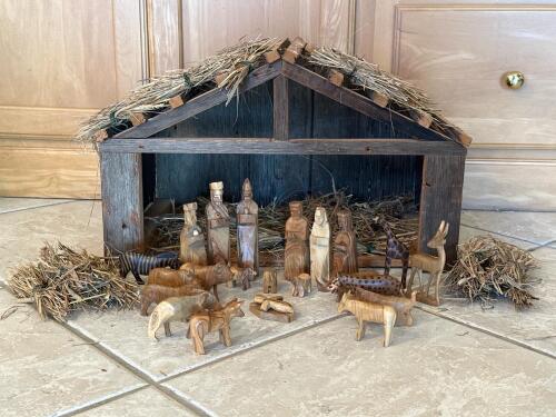Wooden Nativity Scene with Hand-Carved Figures and Stable