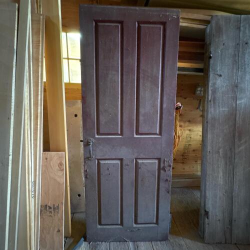 Old Wooden Four-Panel Door with Iron Hardware