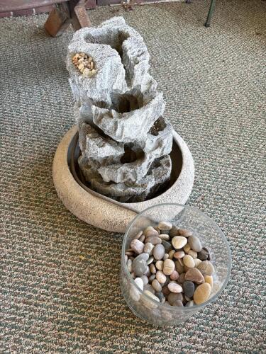 Cascading Stone-Style Tabletop Fountain with River Rocks