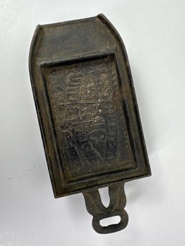 Mrs. Stewart's Magic Blueing Cast Iron Advertising Paperweight