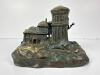 Bronze Sculpture of Ruined Buildings with Bare Trees