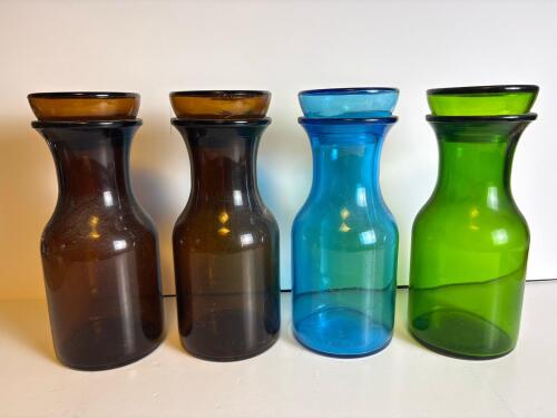 Four Mid-Century Style Colored Glass Carafes