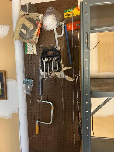 Basement Picker's Lot-tools, paints, and shelving.