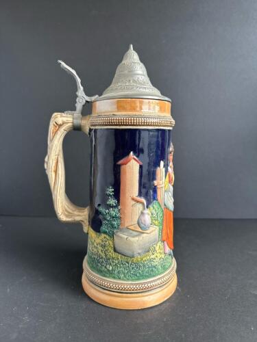 German Beer Stein With Pewter Lid in Relief-Decorated Style