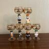 Set of Six Figural Stemmed Glasses with Floral Decoration