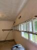 White Metal Aluminum Extension Ladder and Tree Pruning Pole Saw and Ladder Support