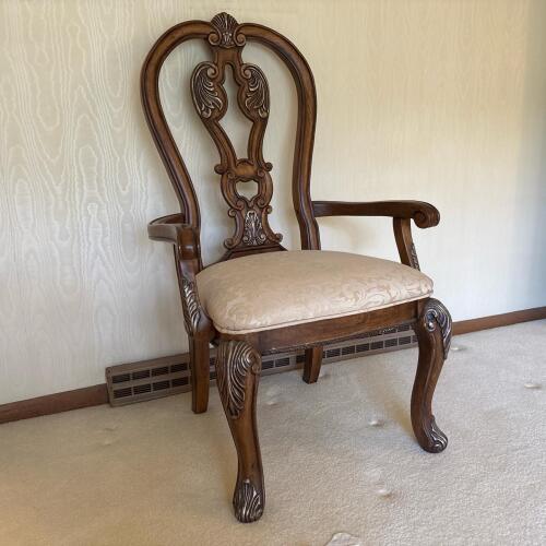 Carved Upholstered Armchair in Rococo Style