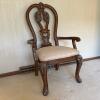 Carved Upholstered Armchair in Rococo Style