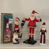 Trio of Santa Claus Figurines