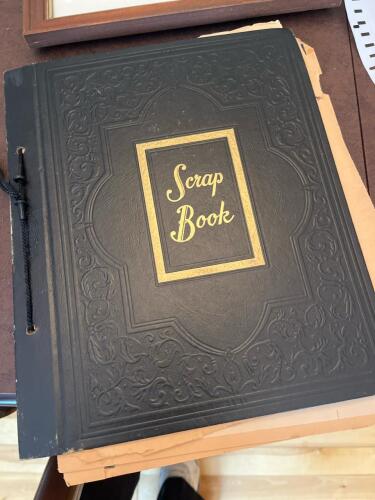 Vintage Family Scrapbook With Photographs and Typed Memories