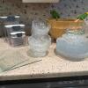 Assorted Glass Bowls, Plates, Canisters, and Wooden Salad Bowl