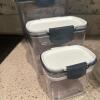 Assorted Glass Bowls, Plates, Canisters, and Wooden Salad Bowl - 4