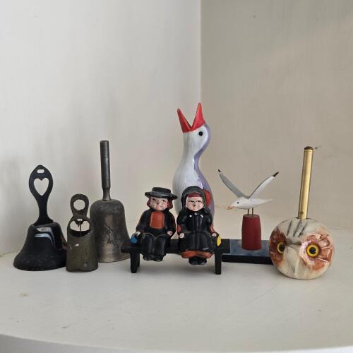 Assorted Decorative Bells, Figurines, and Table Accessories