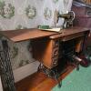 Singer Model 27 Treadle Sewing Machine in Oak Cabinet